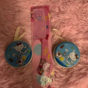 Hello kitty hard case zip close tins.